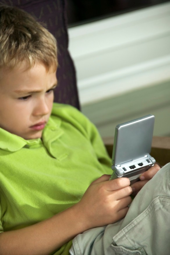 Boy Playing a Video Game